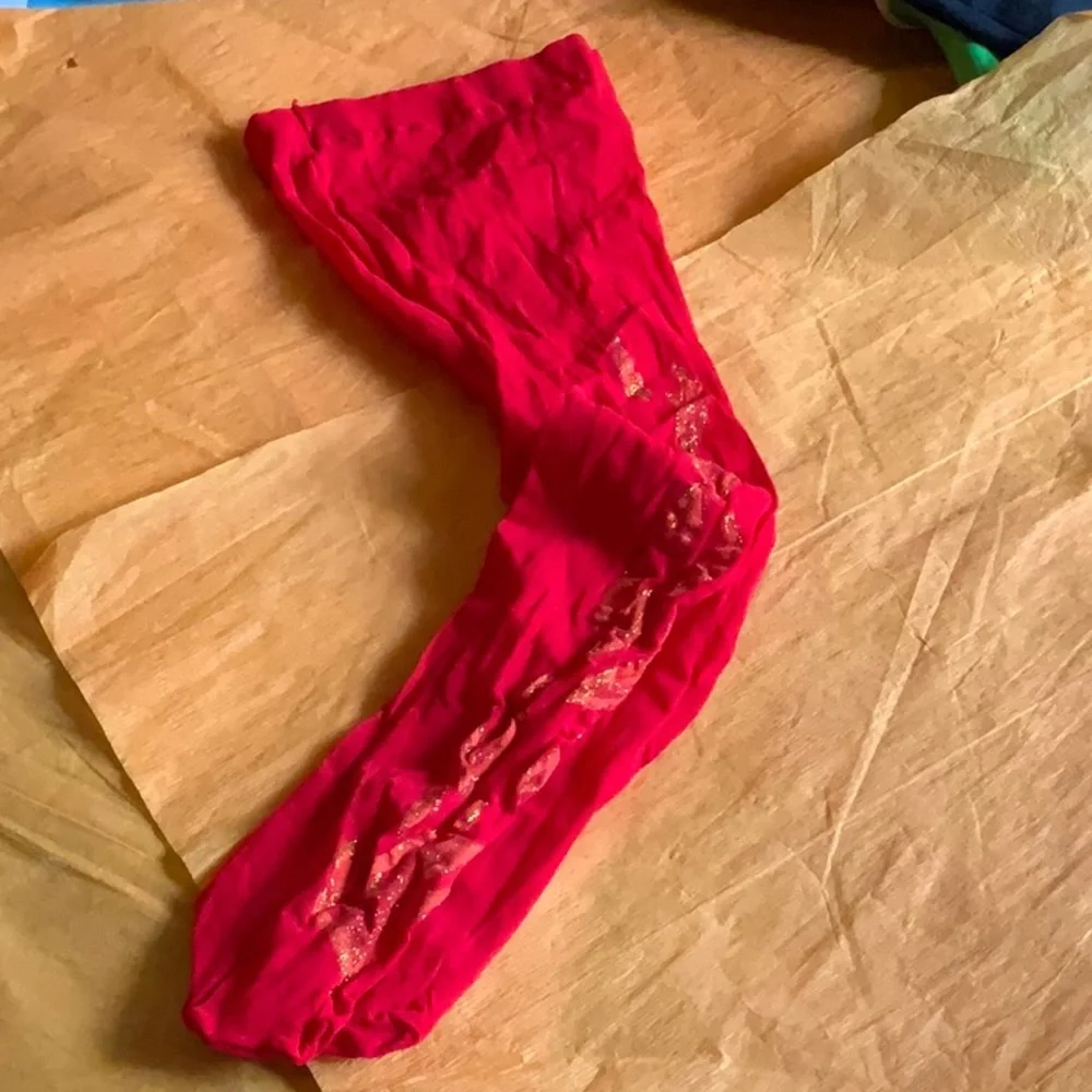 Red tights with flames on sides